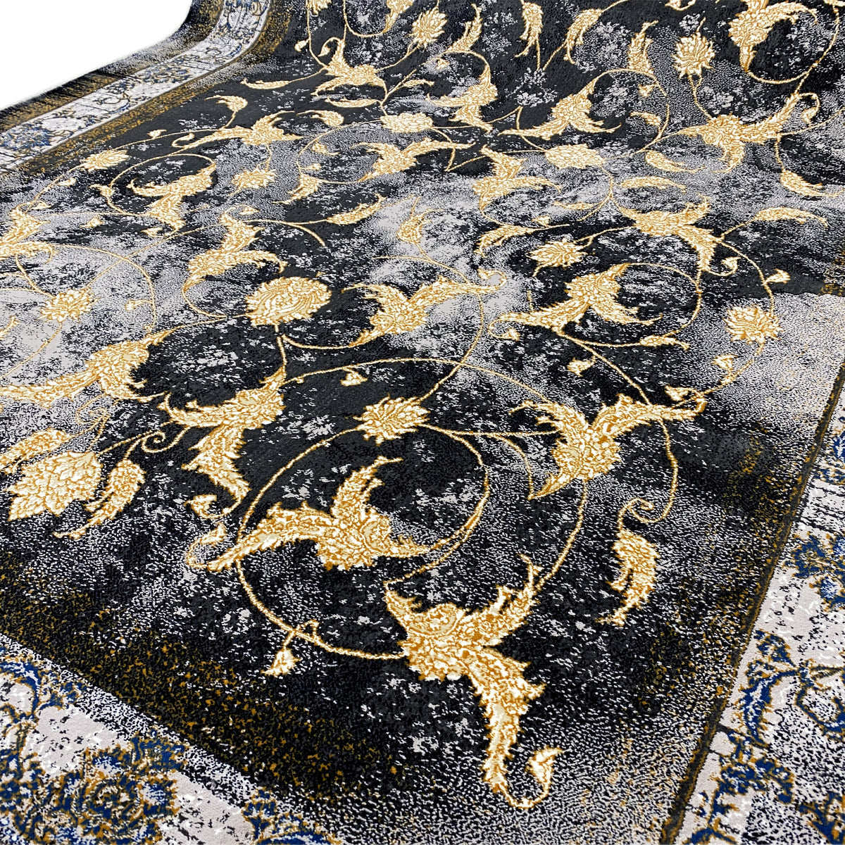 絨毯 160x230 cm、暗い背景に映える金色の蔓模様と花柄装飾のクローズアップ