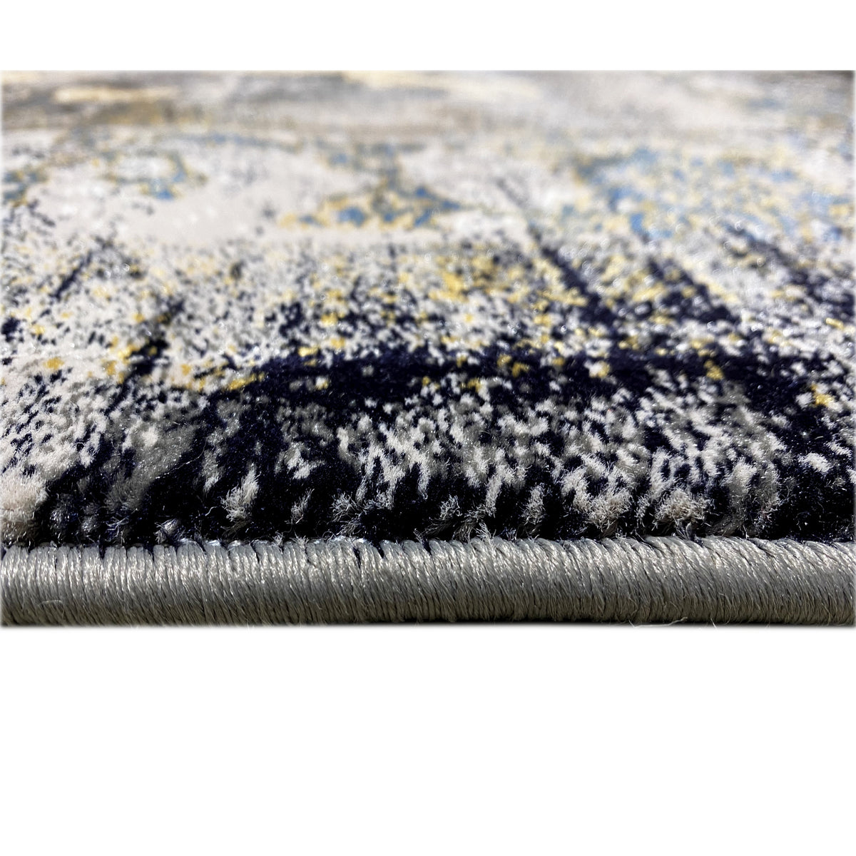 Kenzaラグ 160x230 cm:フリンジと柄のあるパイルの縁のクローズアップ