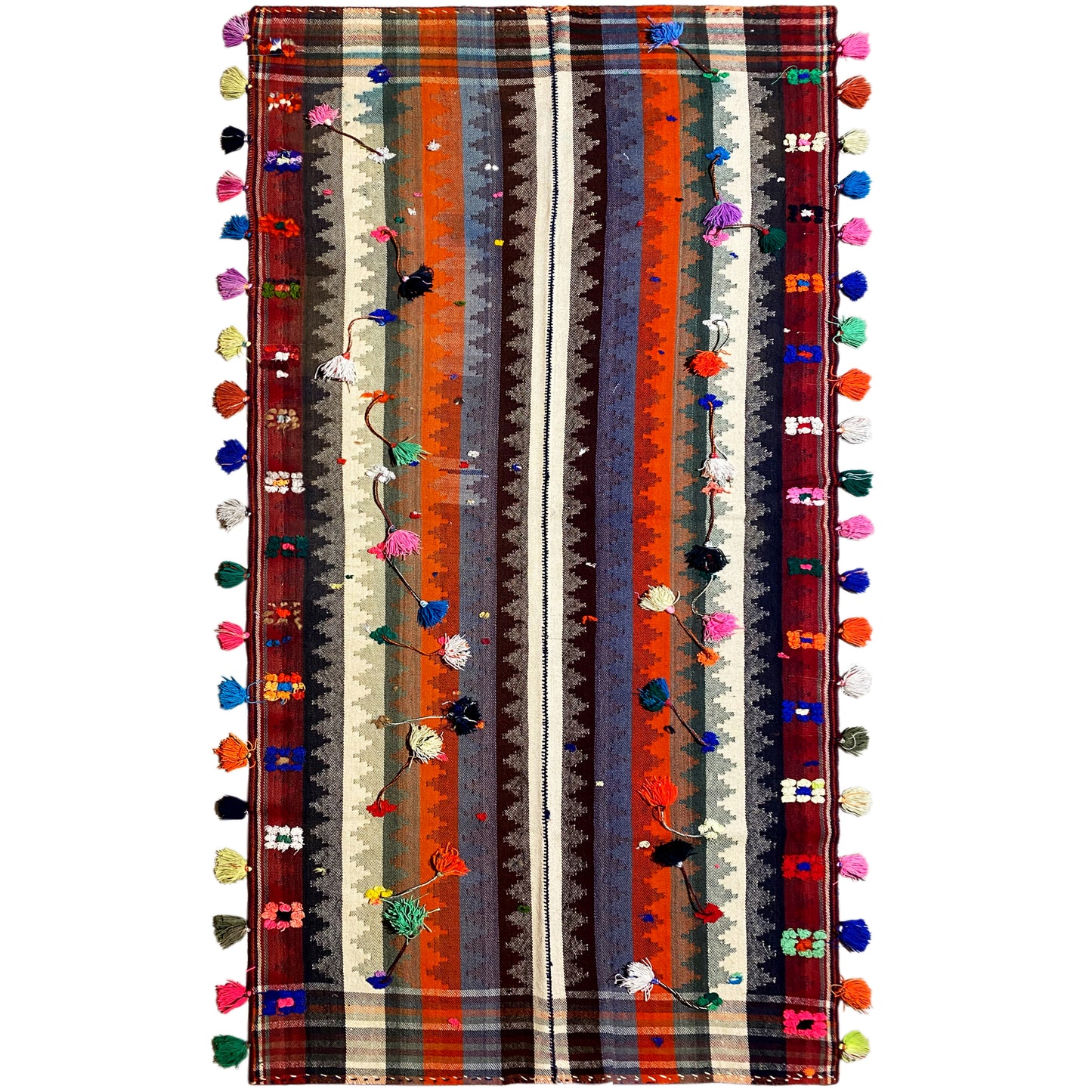 Wohnzimmer bunter Jajim Teppich handgewebt mit geometrischem Streifenmuster und Troddeln