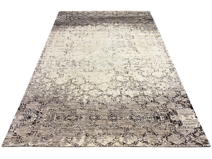 Rechteckiger Teppich mit zweifarbigem abstraktem Muster in Beige und Grau