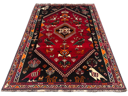 Shiraz Qashqai-Teppich, rechteckig, rotes Zentrum mit Tiermotiven und dunkler Umrandung