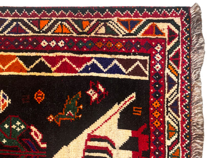 Shiraz Qashqai-Teppich Detail der Bordüre mit Fransen und mehrfarbigen geometrischen Motiven