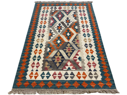 Ethno Kelim Teppich aus handversponnener Wolle, blaues Tribal-Design